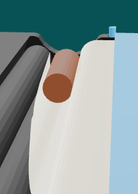 The corner of the paper under the tip, front view